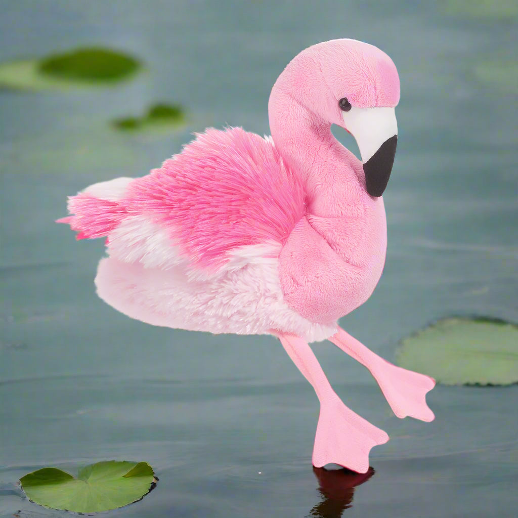 Plush flamingo toy on a white background