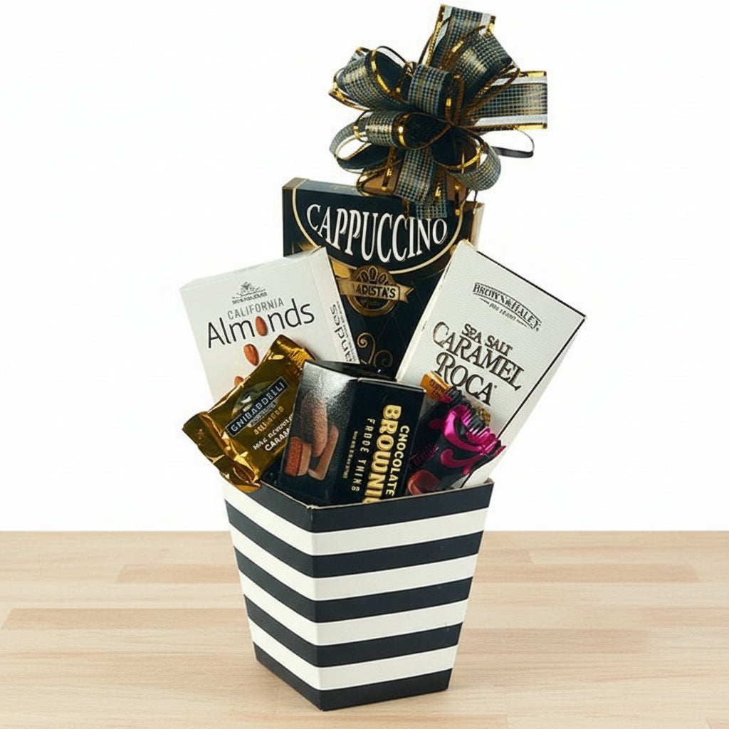 Gift basket with chocolate bars, cookies, and a bow on a white background