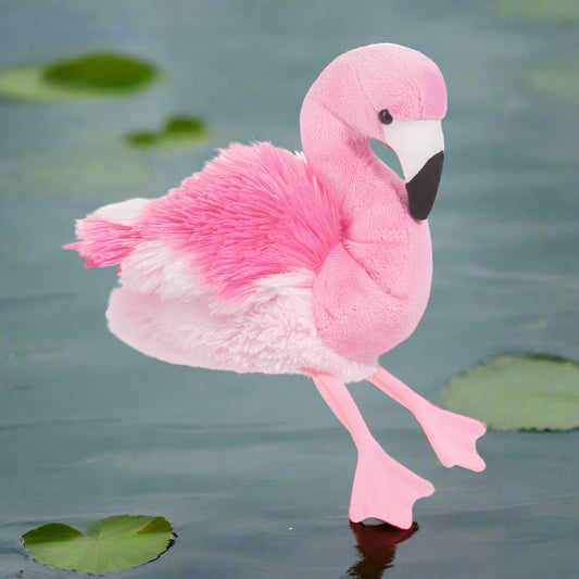 Plush flamingo toy on a white background
