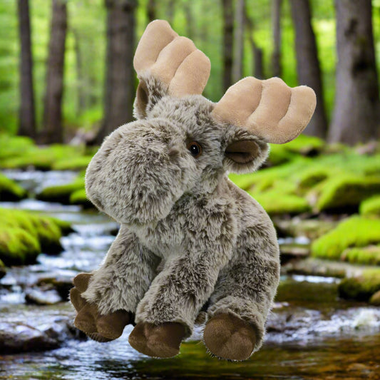 Plush moose toy on a white background
