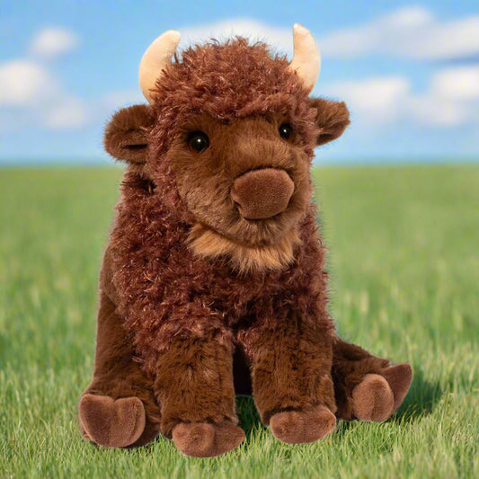 Plush toy bison on a white background